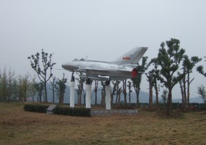 Jet-fighter airplane on a plinth in China 30°43′N 111°17′E 